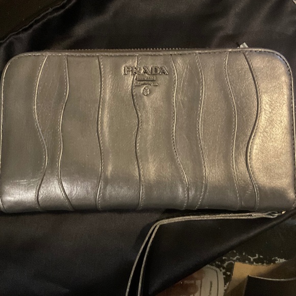 PRADA Handbags - 💘✨INVENTORY SALE✨Authentic PRADA Metallic Grey Leather Wallet✨💘